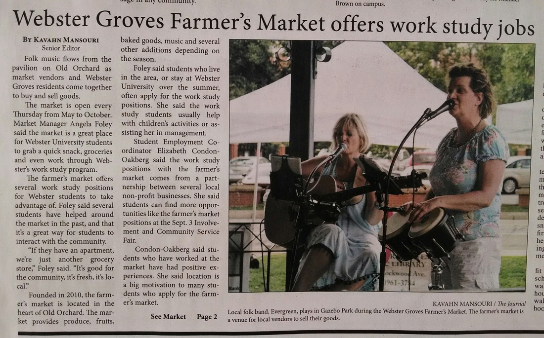 Robin performing with Evergreen at the Webster Groves Farmer's Market, as photographed in The Journal